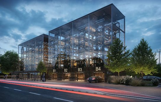Wizualizacja architektoniczna projektu miejskiego wielopoziomowego parkingu samochodowego, zaprojektowanego w stylu nowoczesnym, o widocznej stalowej konstrukcji z wykorzystaniem szkła, zlokalizowanego w okolicy przystanku autobusowego