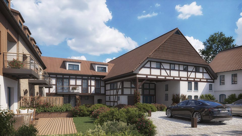 Wizualizacja architektoniczna zespołu historycznych budynków w stylu niemieckim przekształconego w kameralne osiedle mieszkaniowe